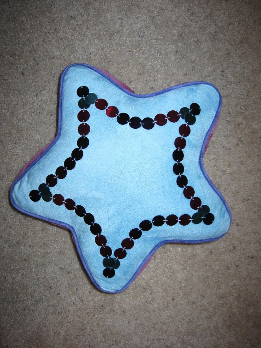 Star shaped pillow blue and pink with sequins